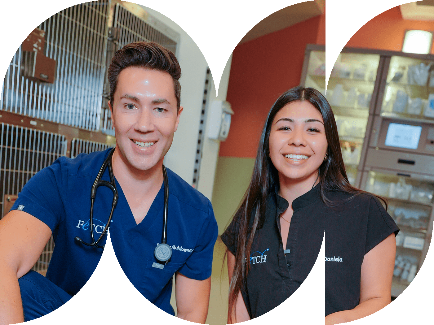 male doctor and female technician smiling and posing together indoors
